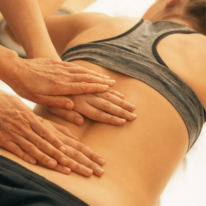 A physical therapist performing manuel therapy